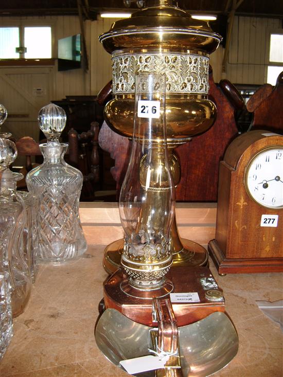 Large brass oil lamp and a copper oil lamp